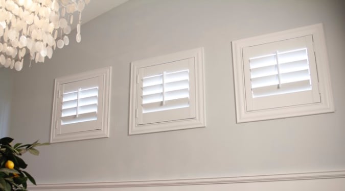 Small windows with plantation shutters